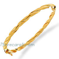Yellow gold twisted tube bangle