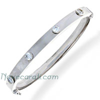 White gold tube bangle with cubic zirconia on both sides